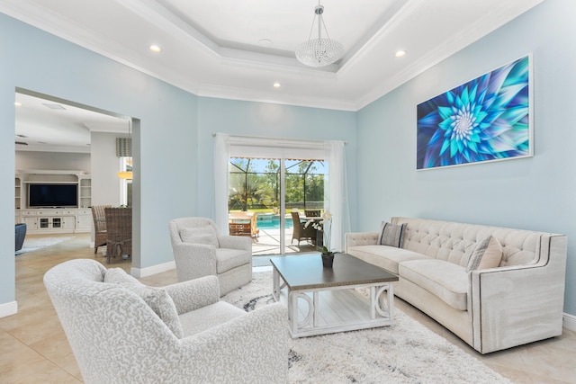 living room with light tile patterned flooring, a tray ceiling, and crown molding