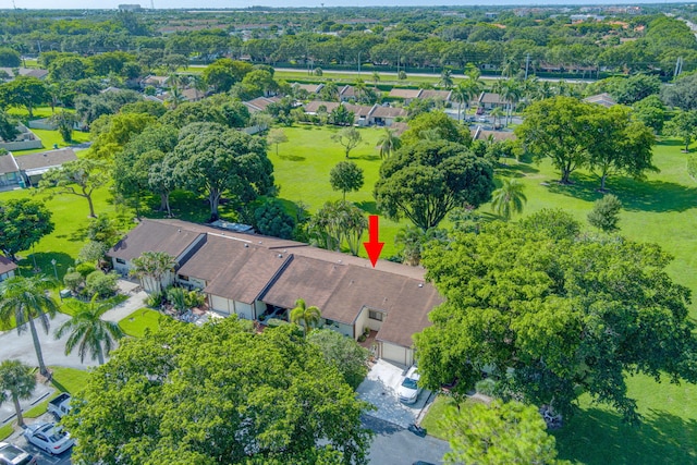 birds eye view of property with a residential view