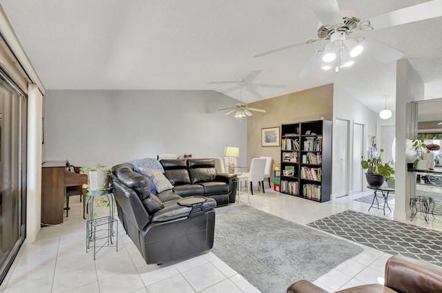 living area with light tile patterned floors and lofted ceiling