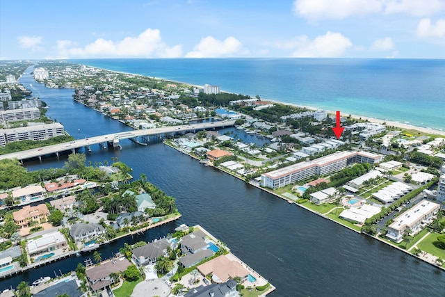 birds eye view of property featuring a water view