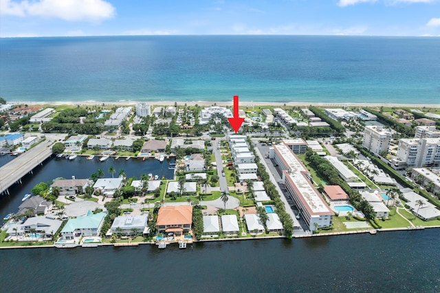 birds eye view of property featuring a water view