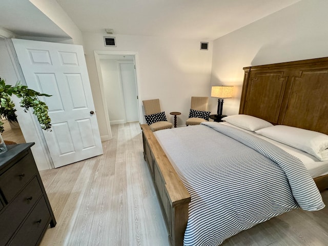 bedroom with light hardwood / wood-style flooring