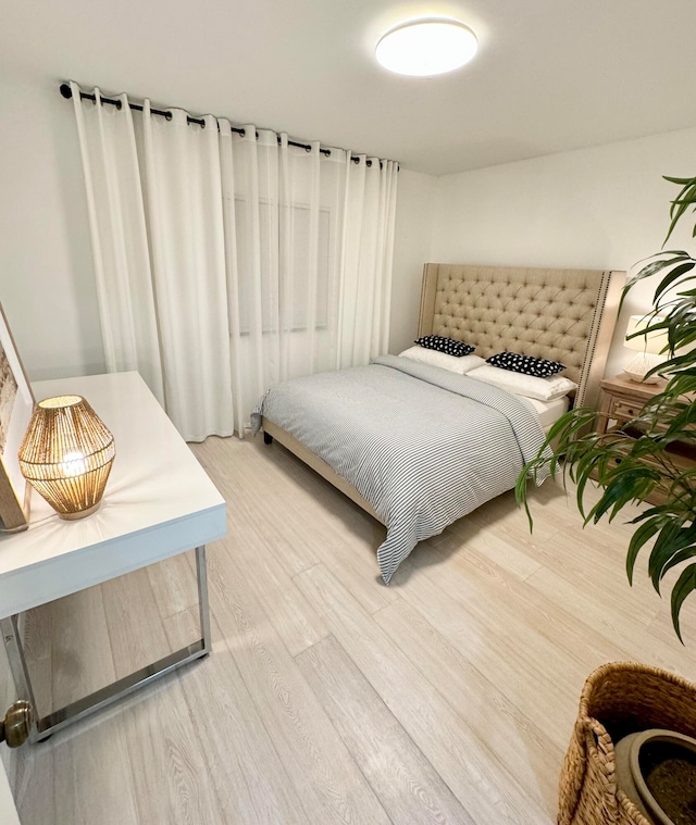 bedroom featuring hardwood / wood-style floors