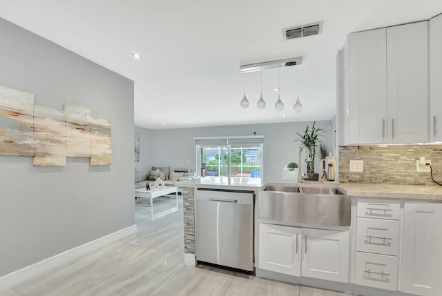 kitchen with white cabinets and dishwasher