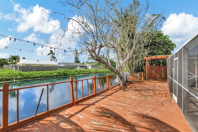 wooden deck with a water view