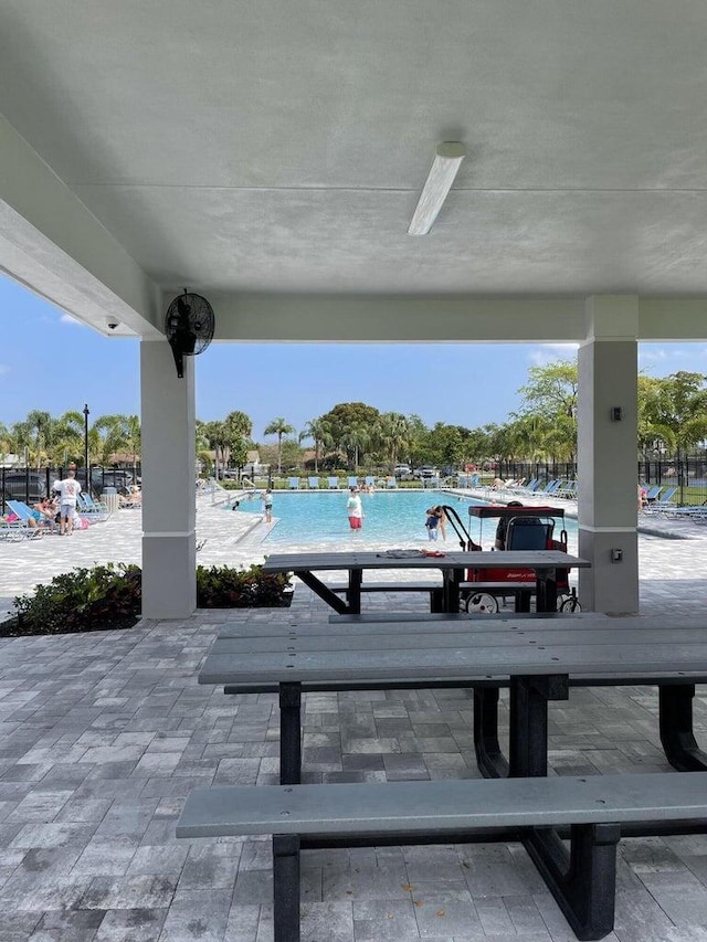 view of patio with a community pool