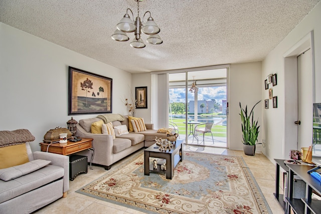 living room featuring a chandelier, light tile patterned floors, and a textured ceiling