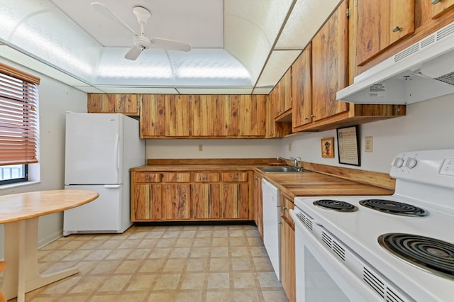 kitchen with white appliances, sink, and ceiling fan