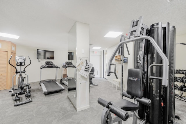 workout area with light carpet