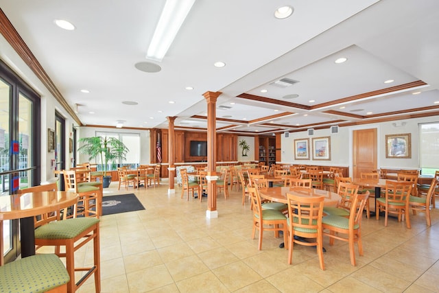 tiled dining space with coffered ceiling, ornamental molding, and decorative columns