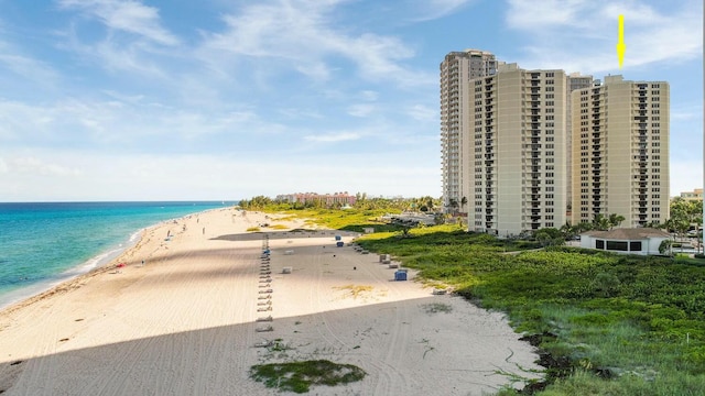 property view of water featuring a beach view