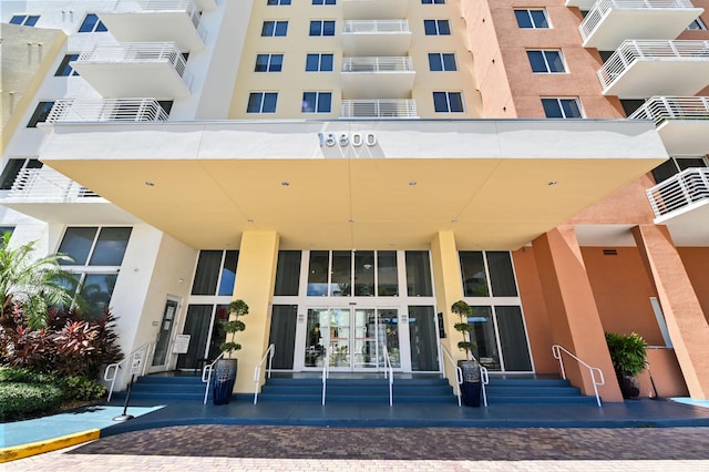 property entrance with a balcony