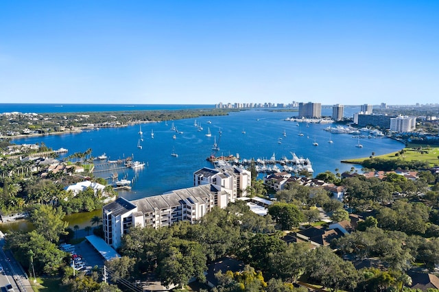 aerial view featuring a water view and a city view