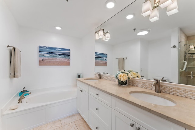 bathroom with vanity, plus walk in shower, and tile patterned flooring