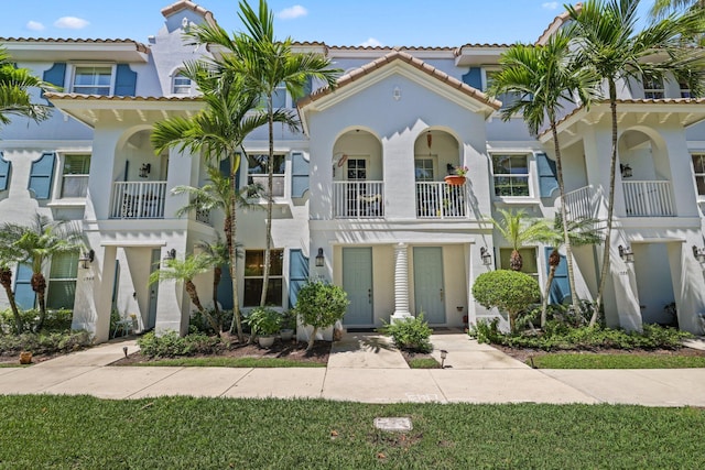 view of front of home with a balcony