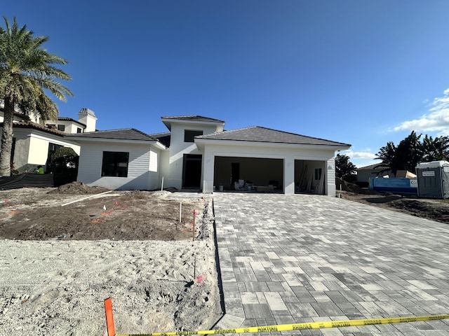 view of front of home with a garage