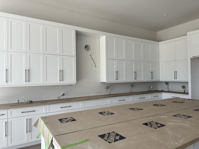 kitchen with white cabinets