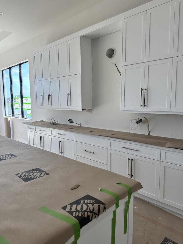 kitchen with white cabinets