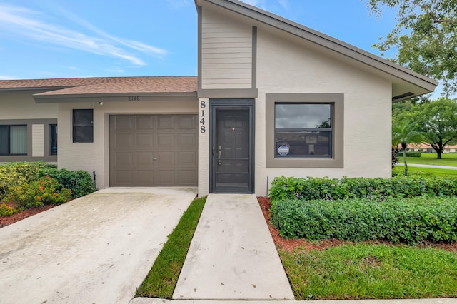 view of front of house with a garage