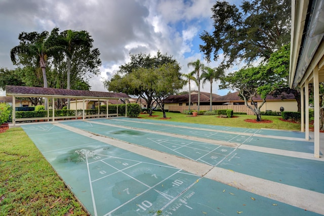 view of community featuring a yard