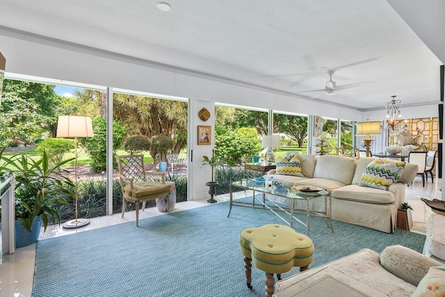 sunroom with ceiling fan