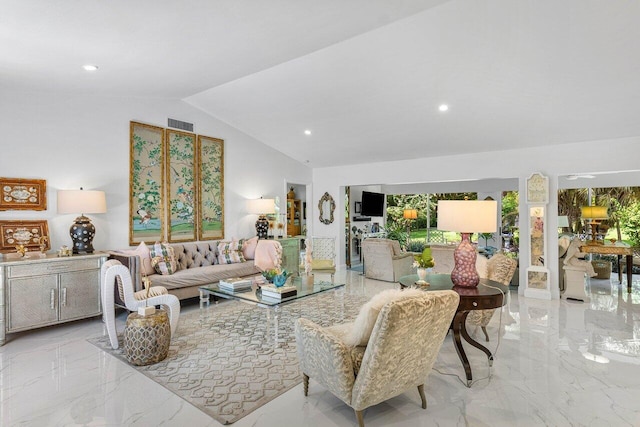 living room featuring vaulted ceiling