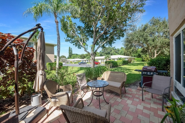 view of patio with a grill