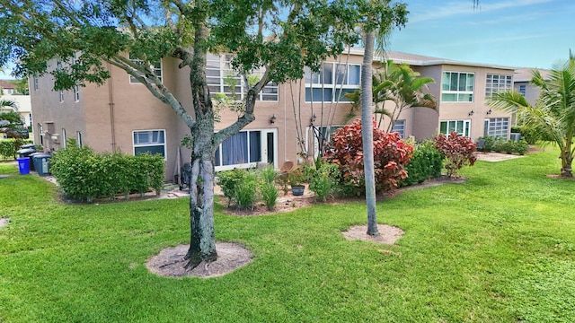 exterior space featuring a lawn