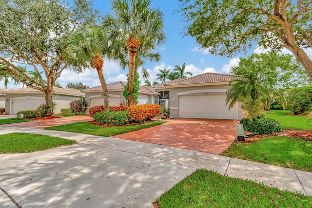 view of front of property with a garage