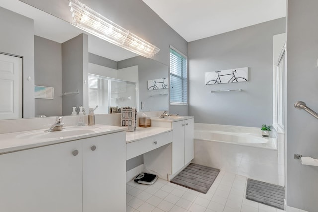 bathroom with tile patterned flooring, separate shower and tub, and vanity