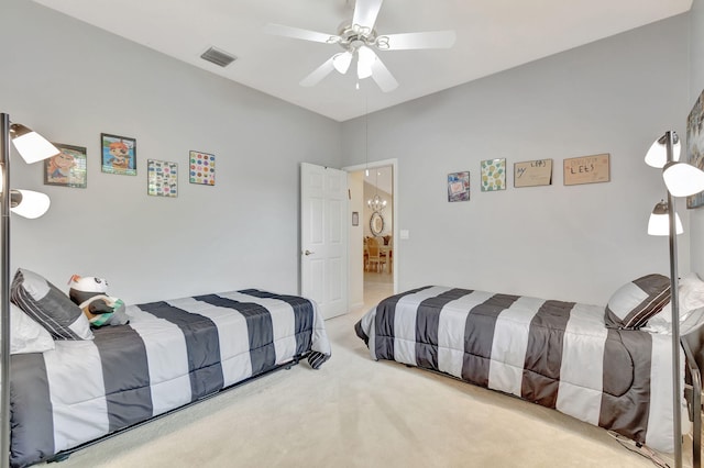 bedroom with light carpet and ceiling fan