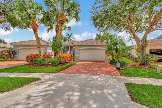 mediterranean / spanish-style home featuring a garage