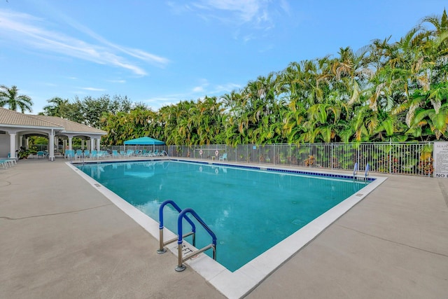 view of swimming pool featuring a gazebo