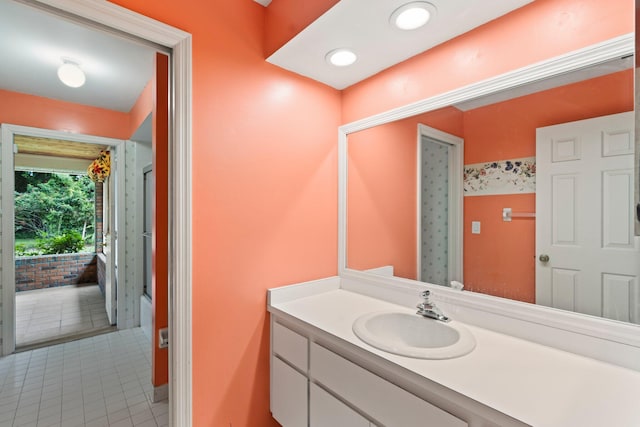 bathroom with vanity and tile patterned flooring