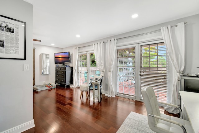 office area with dark hardwood / wood-style flooring