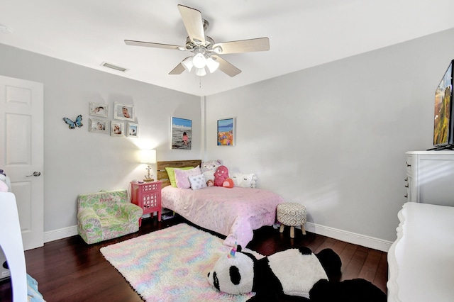 bedroom featuring ceiling fan and dark wood-type flooring