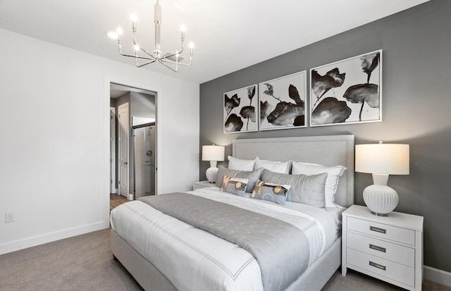 carpeted bedroom featuring a notable chandelier and baseboards