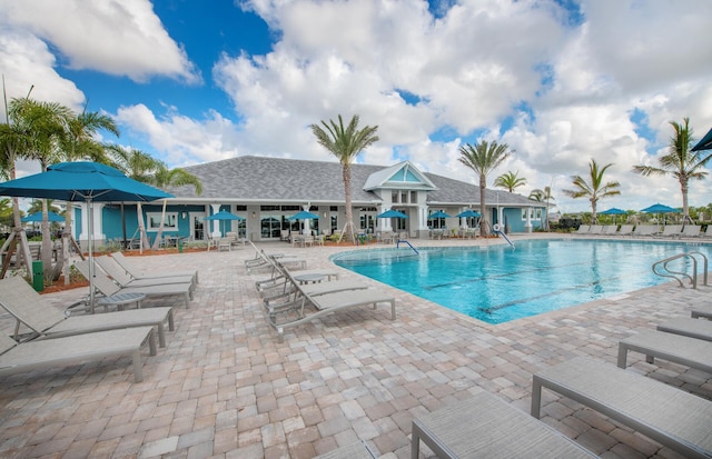 pool featuring a patio area