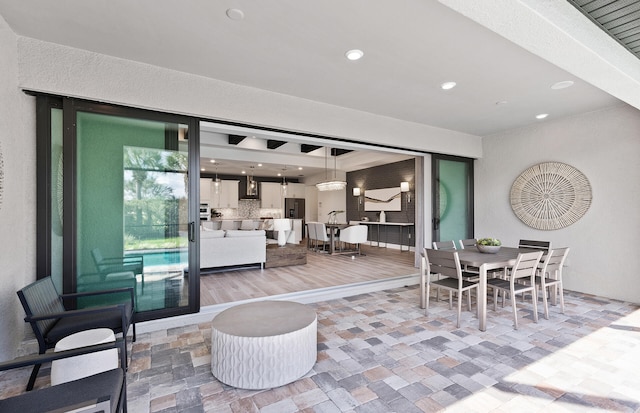 dining space featuring recessed lighting