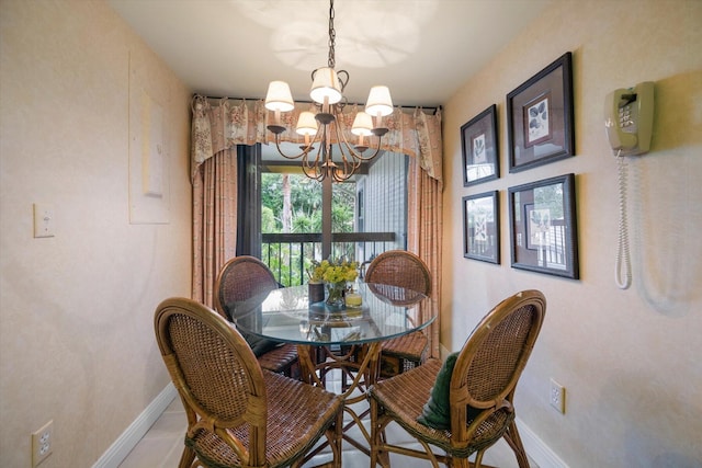 dining room featuring a chandelier