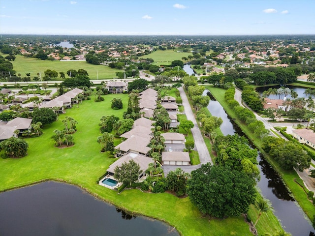 bird's eye view with a water view