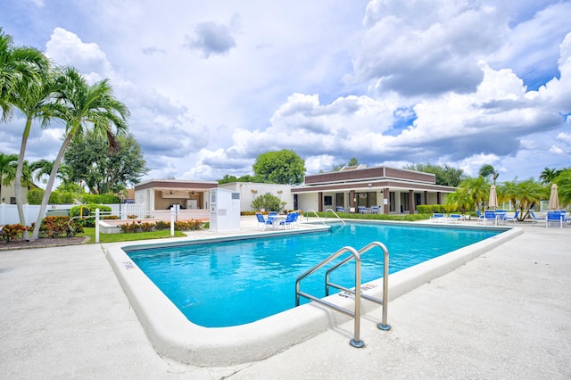 view of pool featuring a patio