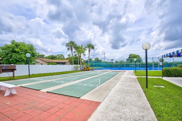 view of community featuring a lawn