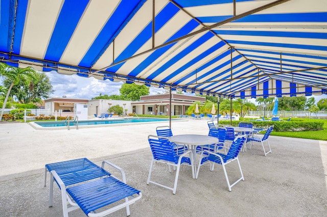 view of patio / terrace featuring a community pool