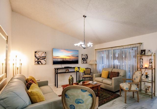 living room featuring an inviting chandelier, lofted ceiling, and a textured ceiling