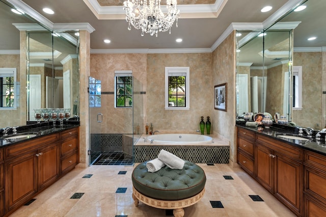 bathroom featuring an inviting chandelier, plus walk in shower, tile walls, crown molding, and vanity