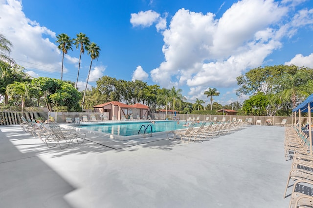 view of swimming pool featuring a patio