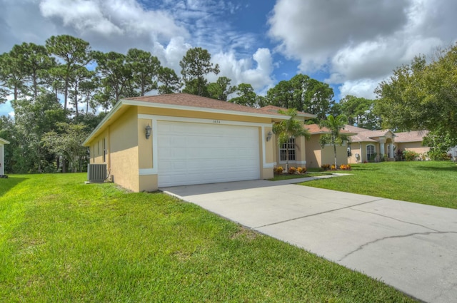 ranch-style house with a garage, a front yard, and central air condition unit