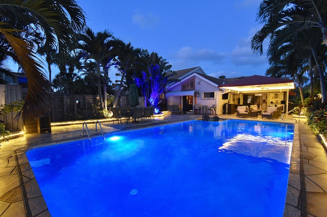 view of swimming pool featuring a patio area