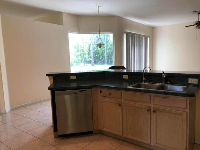 kitchen with decorative light fixtures, light tile patterned floors, stainless steel dishwasher, sink, and ceiling fan